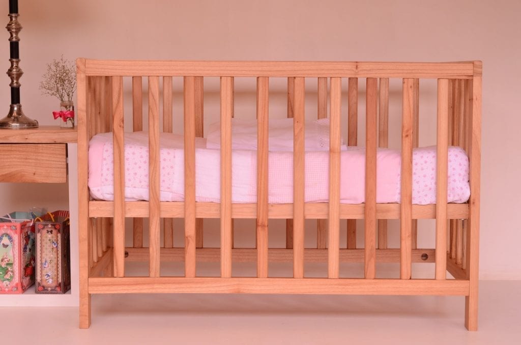wooden baby crib and crib mattress