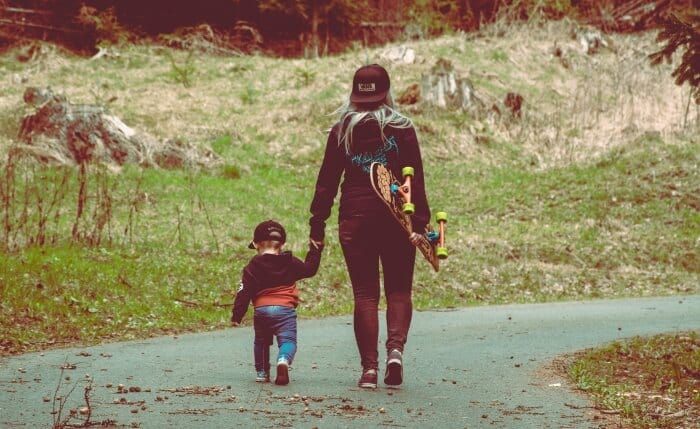 mom and kid with skateboard